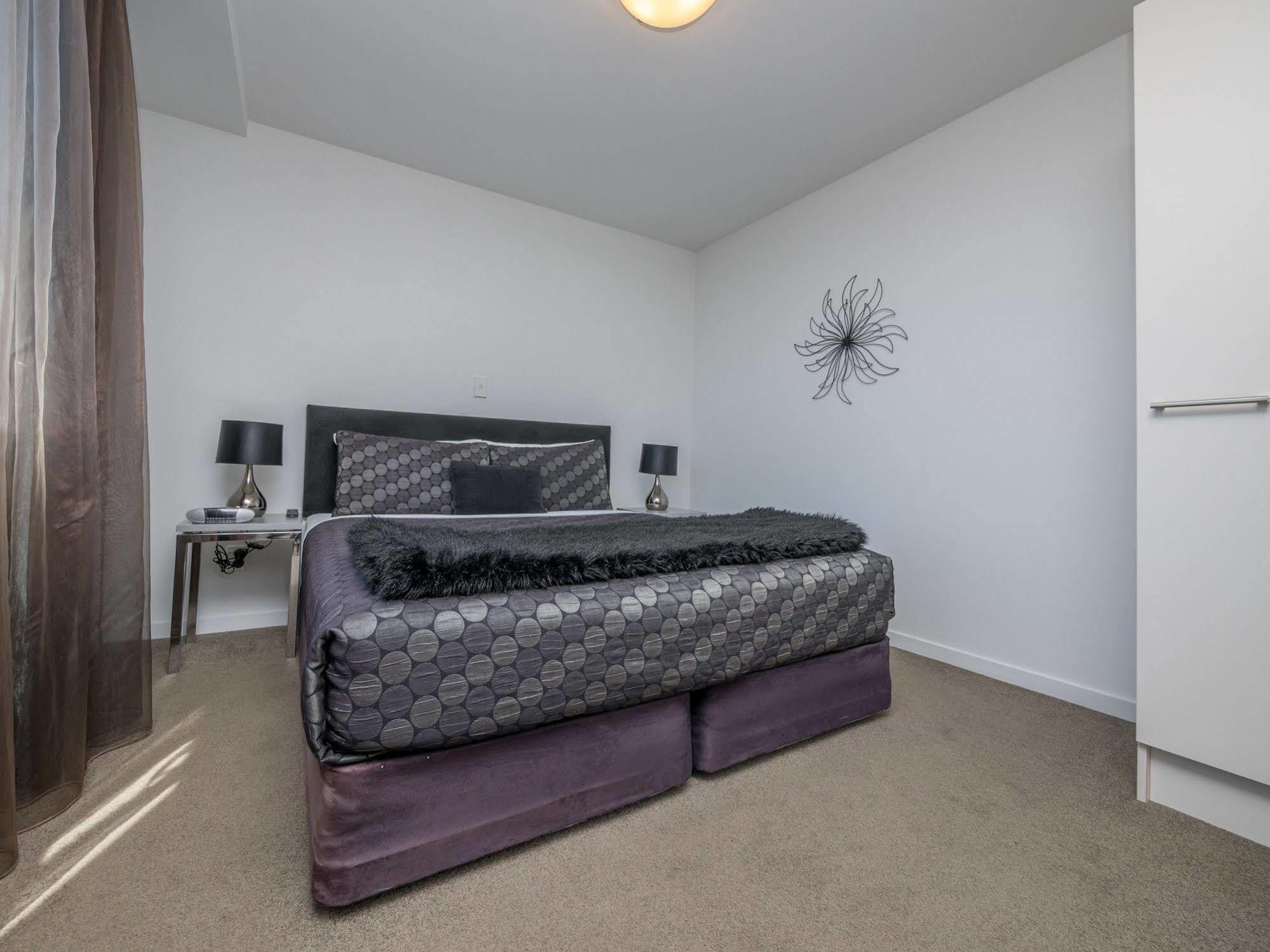 Bellano Motel Suites Christchurch Kültér fotó A bedroom at the hotel